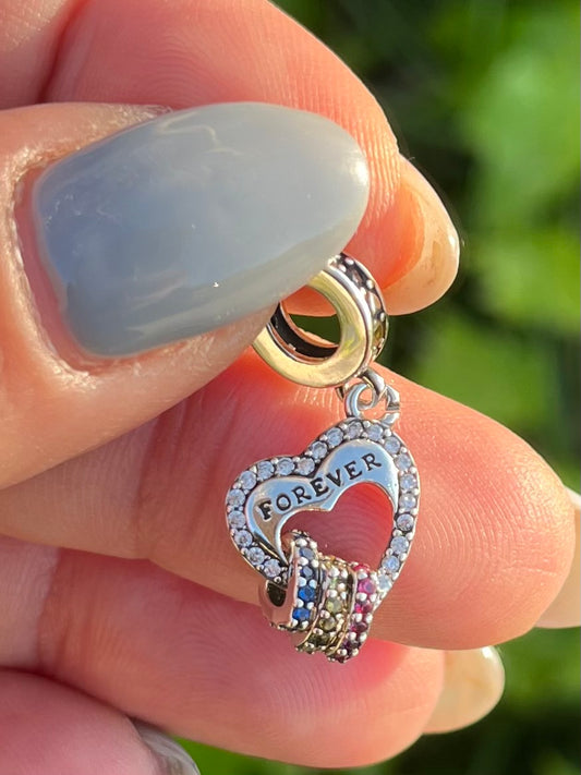 Charm corazón  doble con 3 corazones en plata 925 y circonias de colores
